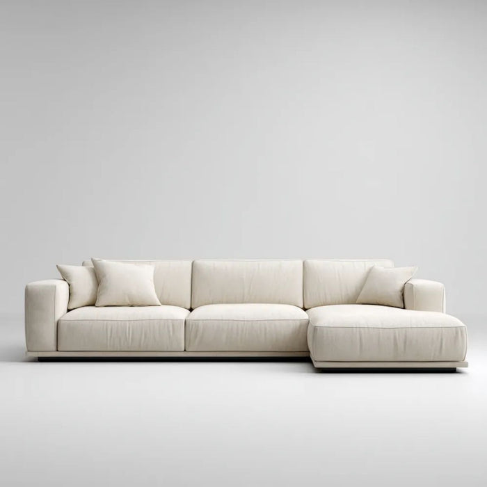 Kremowa sofa narożna w kształcie L z prawostronnym szezlongiem, tapicerowana tkaniną poliestrową, 300 x 170 x 85 cm